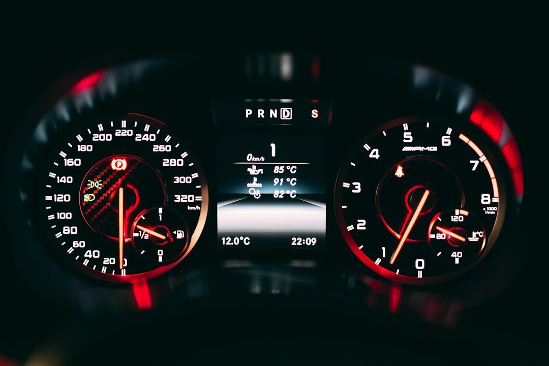 Car and dashboard - Black and red analog speedometer
