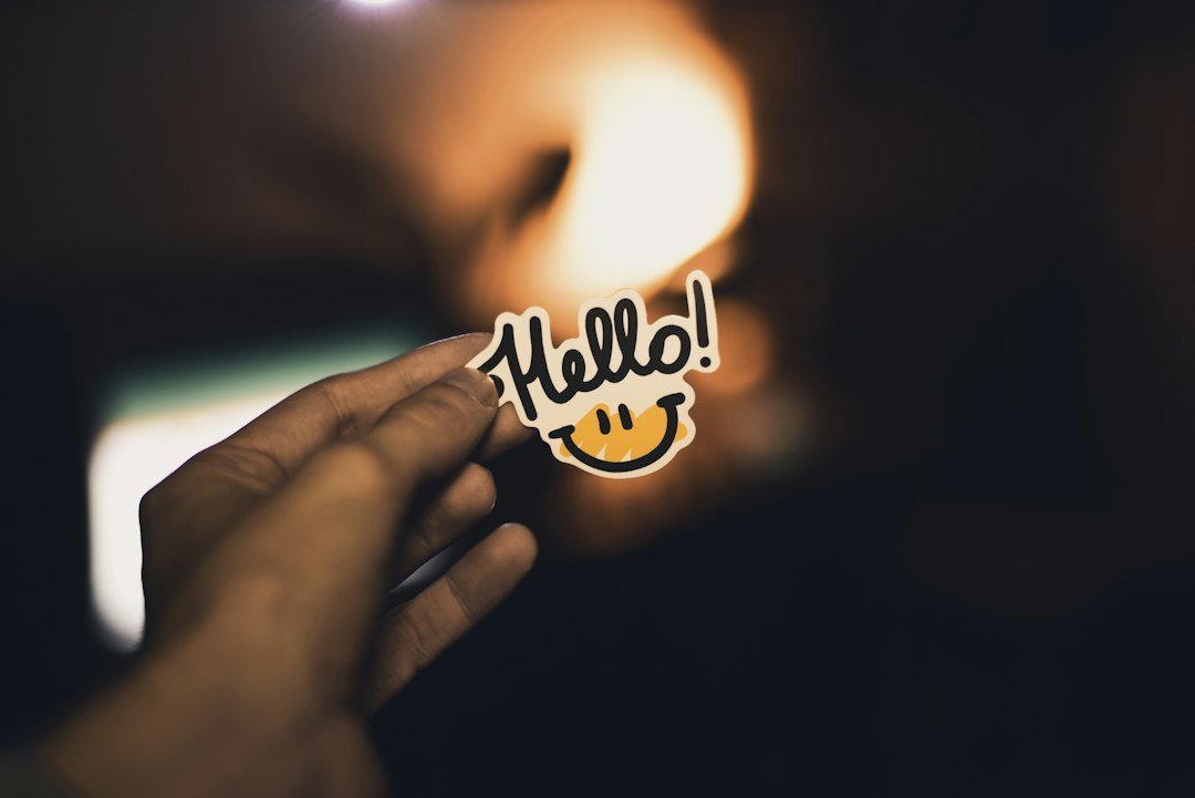 Names and meanings - Person holding Hello! sticker