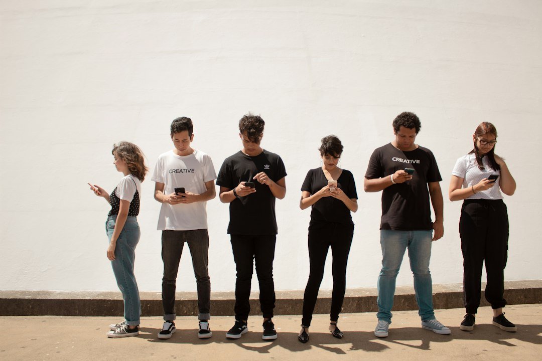 Slang meaning changes - Group of people standing on brown floor